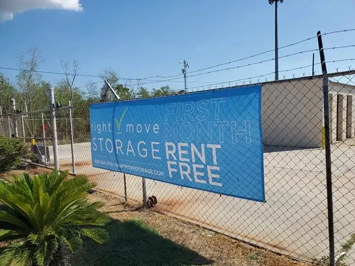 Right Move Storage-Memorial Blvd Fence with sign