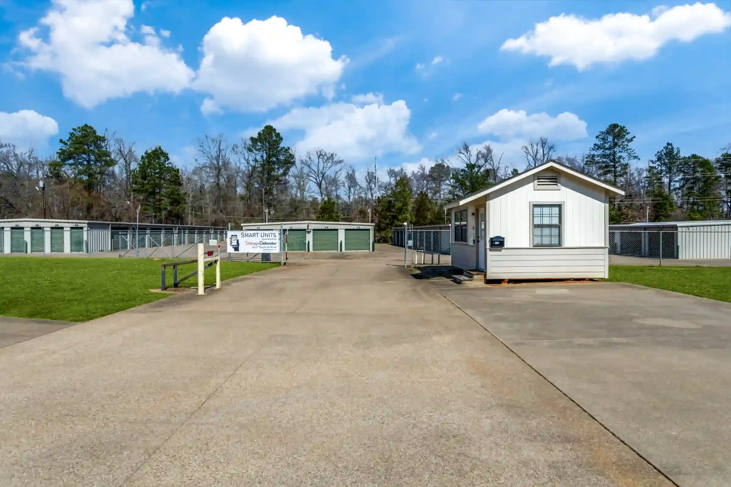 row of self storage units with drive up access, roll up doors, smart units and gated entry