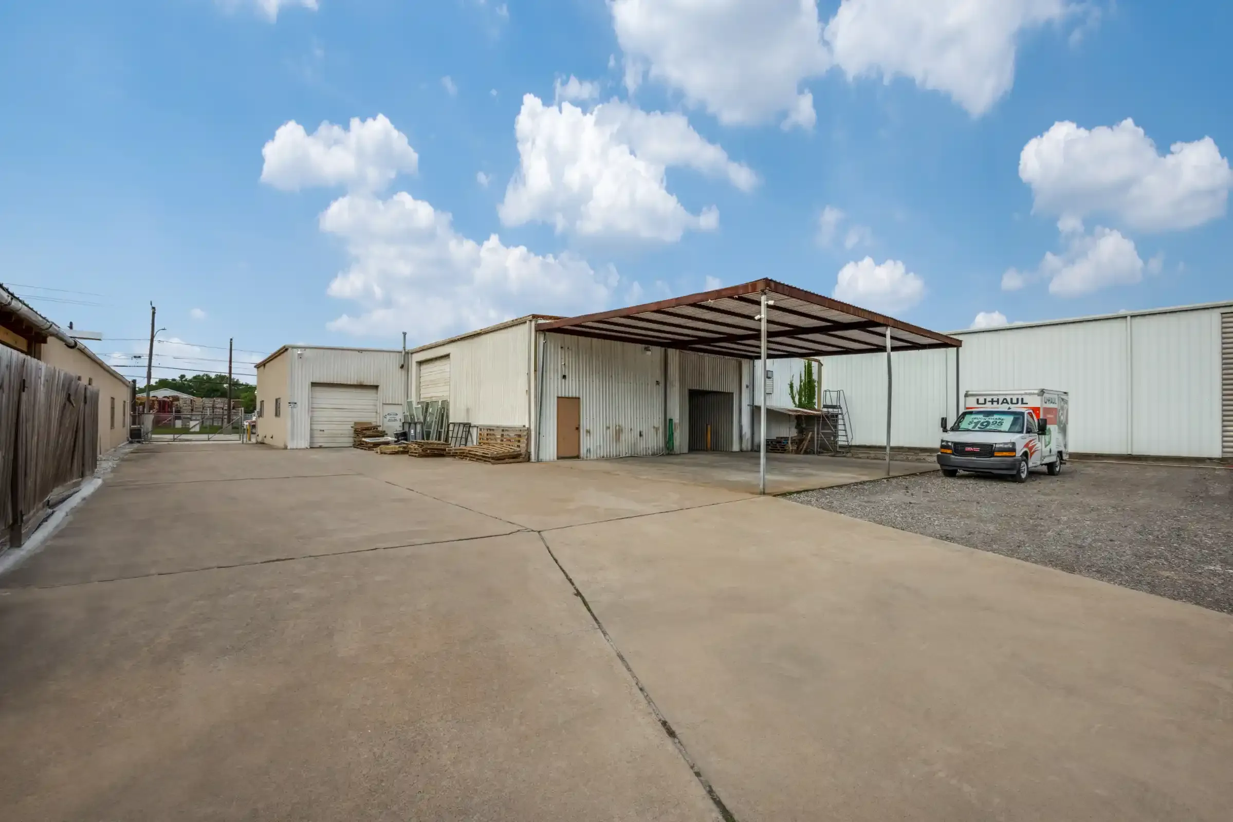 covered parking with u haul parked