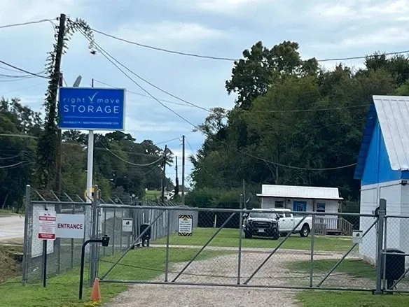 right move sign at gated entry to storage facility