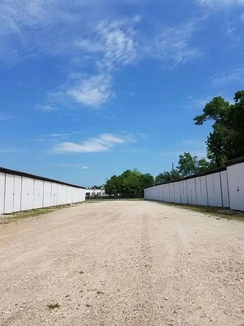 row of self storage units with drive up