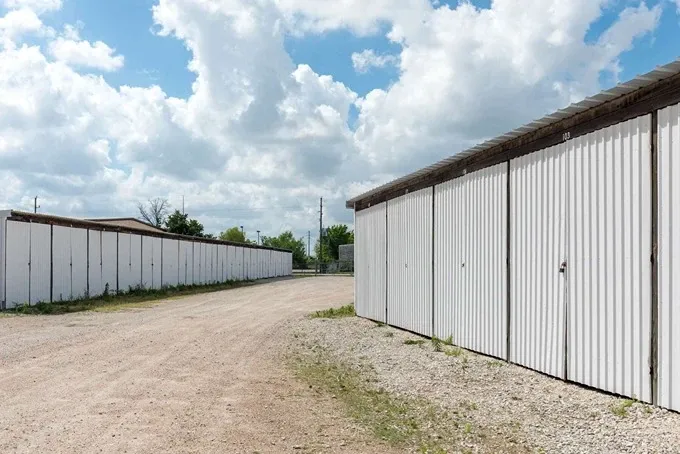 row of self storage units with drive up