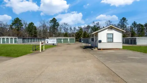 row of self storage units with drive up access, roll up doors, smart units and gated entry