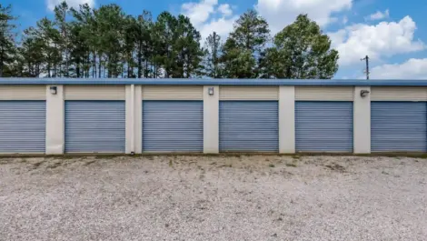 row of self storage units with drive up