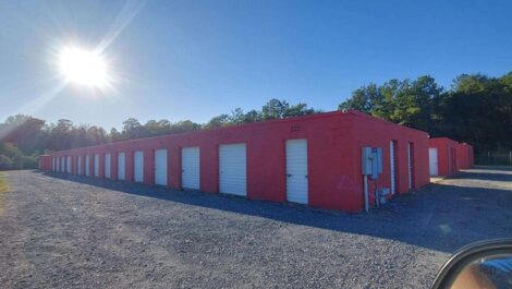 row of self storage units with drive up