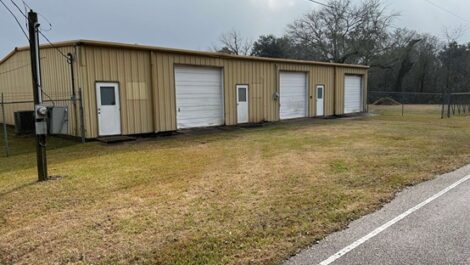 row of self storage units with roll up doors