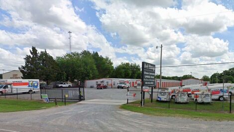 storage facility with u haul trucks parked street view